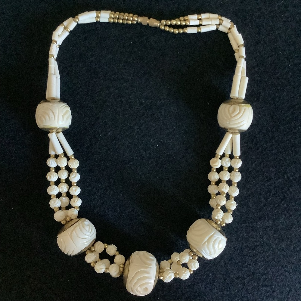 Vintage hand carved bone necklace.